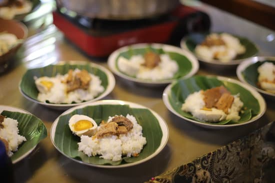 Do You Pick Out Wedding Rings Together 1 Photo of couple holding hands, asking each other, 'Do you pick out wedding rings together'