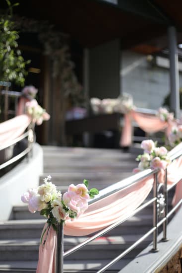 Are weddings worth it - A couple embracing at their beautiful wedding ceremony