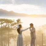 Photo of Hannah attending Kyle and Amanda's wedding, smiling and posing with the newlyweds