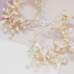 Wedding band worn outside, over the engagement ring for traditional placement