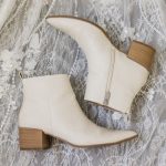 Consider elegant attire in darker hues