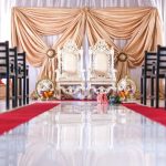 cozy coat, elegant dress, and stylish boots for the cold weather