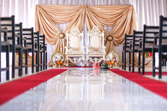 cozy coat, elegant dress, and stylish boots for the cold weather