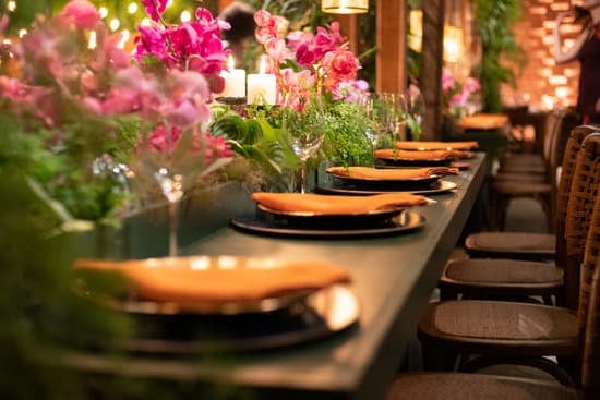 White wedding dress with elaborate bustle, perfect for a vintage-inspired wedding theme