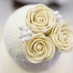 Does a Plus One Bring a Wedding Gift A plus one wedding guest holding a gift