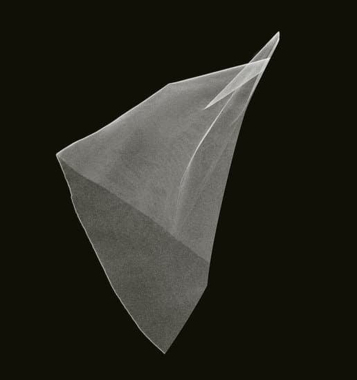 Rustic A Frame Wedding Arch adorned with blooming flowers creates a picturesque setting