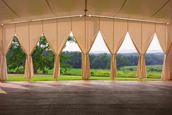 Romantic aisle wedding ceremony decor with flowers and candles