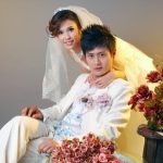 An usher for a wedding is a person who assists guests to their seats